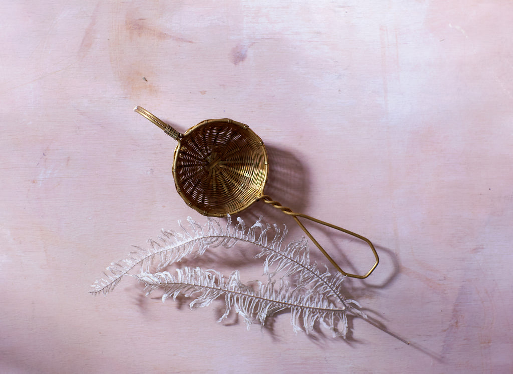 Our brass tea strainers are versatile and hand-crafted by metal artisans. Choose between petite and deep basket strainers from BELLOCQ.