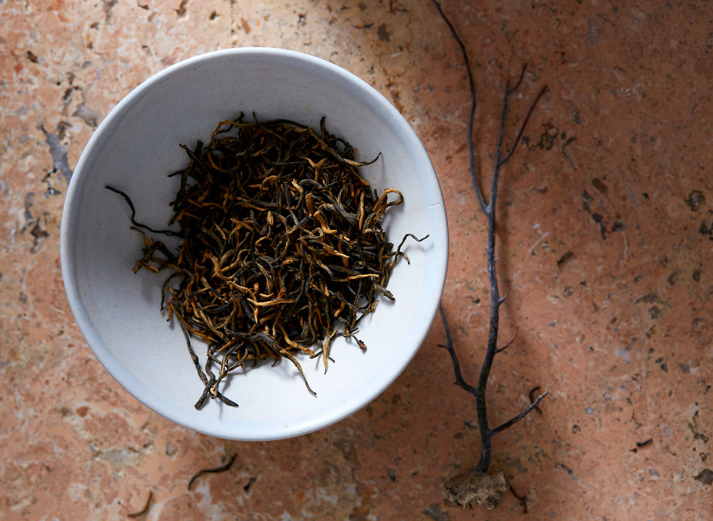 No. 99, Jin Jun Mei is a most sought-after fully-oxidized (black) tea from the Wuyi Mountains of Fujian Province of fine, delicate leaves complete with fuzzy golden tips.